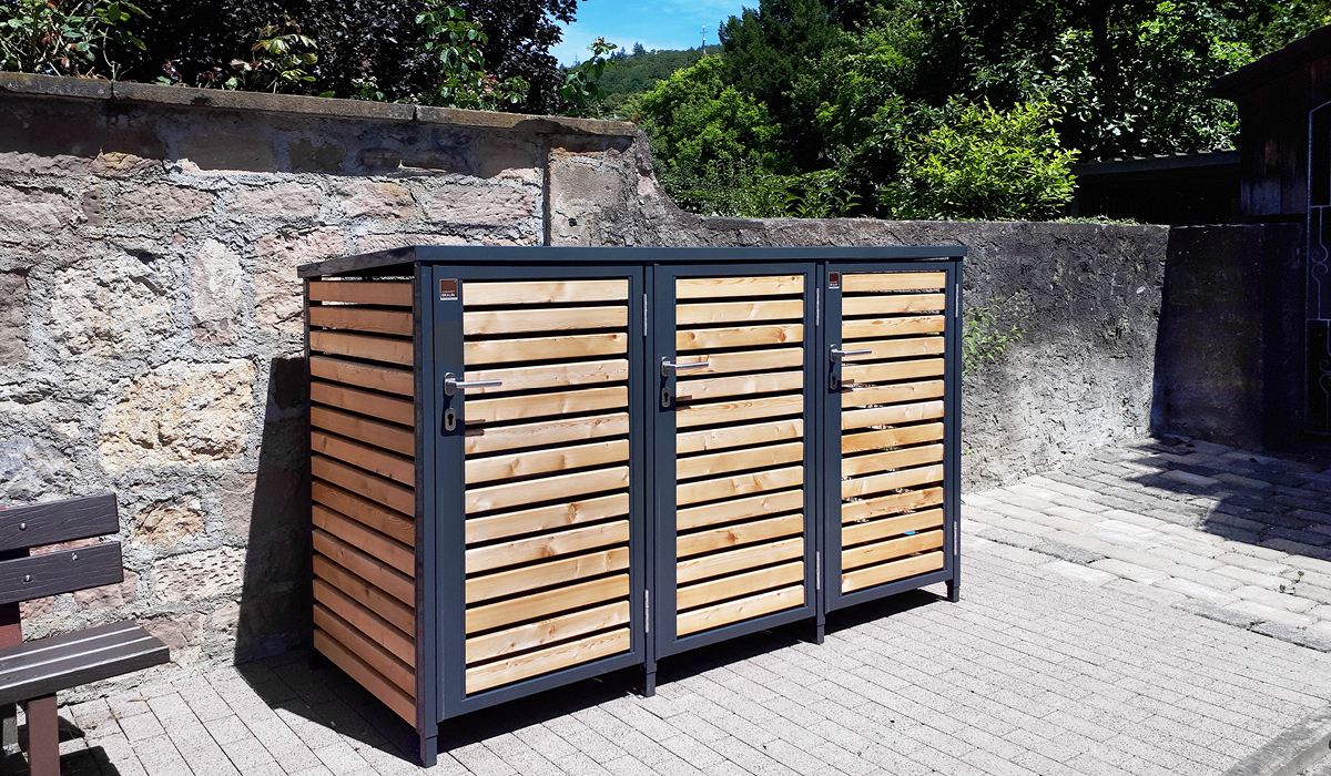<h5>Mülltonnen-Box mit Drehtür aus Holz</h5>